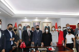 PAKDEMİRLİ VE SARIEROĞLU’NDAN MHP ADANA İL’E ZİYARET…